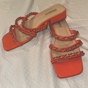 Orange Sandal with Gold Metal Chain Design, one inch heel, never worn